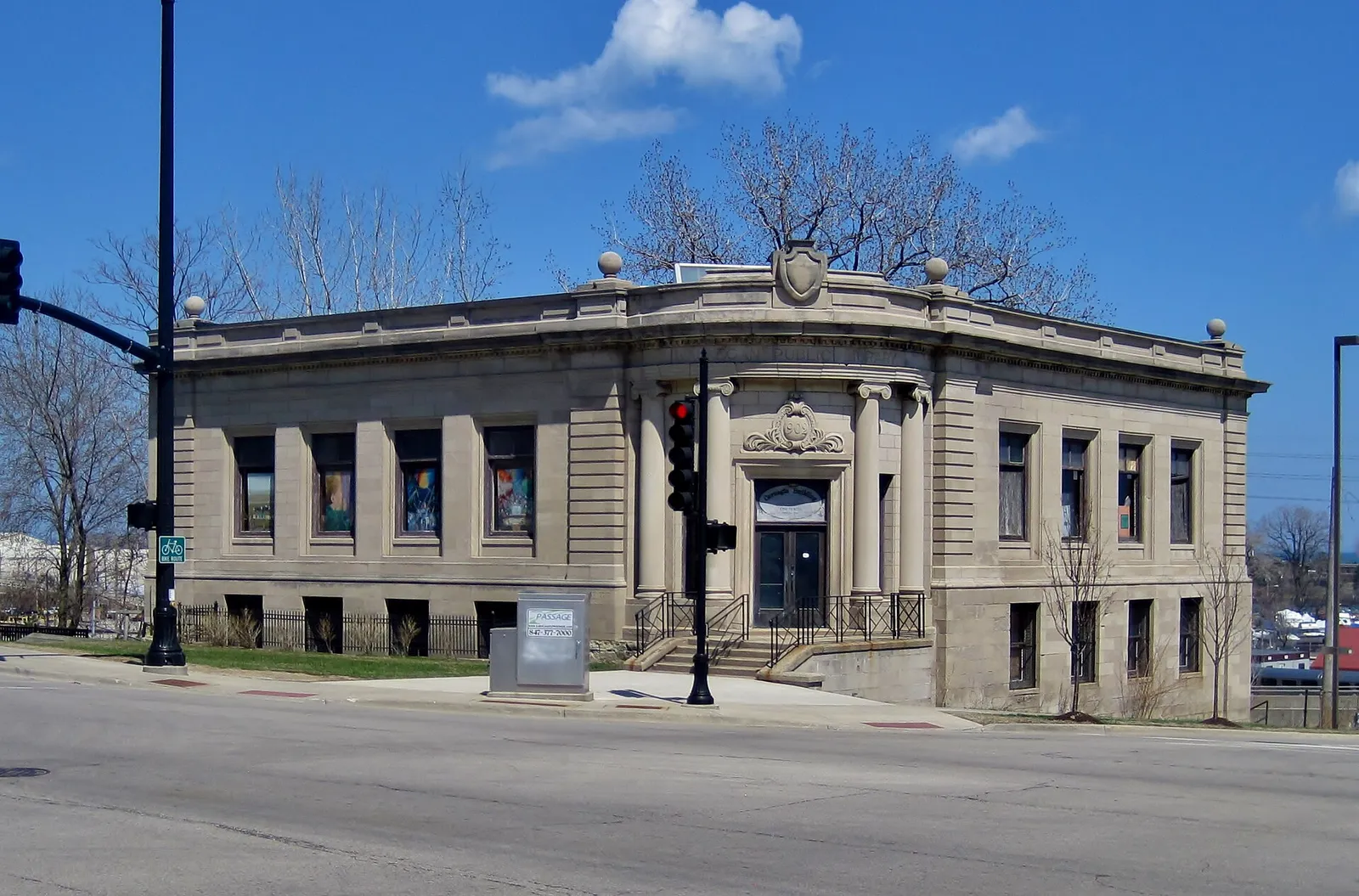 Stone facade and columned entrance of Waukegan’s historic Carnegie Library
